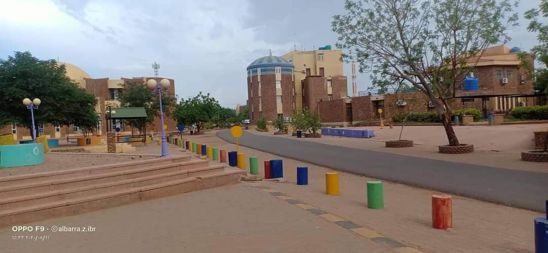 Landscaped grounds and university buildings at AUW